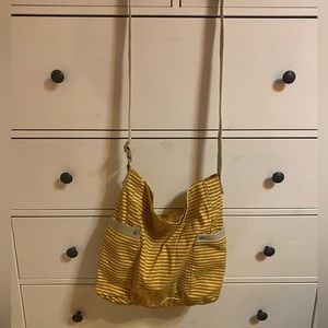 yellow and white stripped bag
